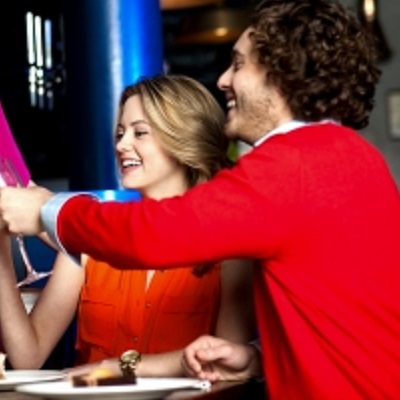 Friends Enjoying Dinner At A Restaurant by stockimages
